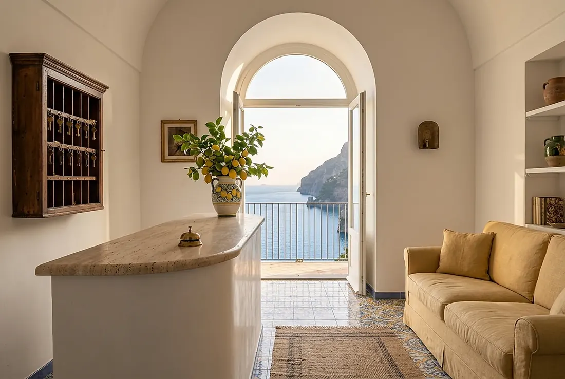 Reception lounge with an arched doorway to the sea